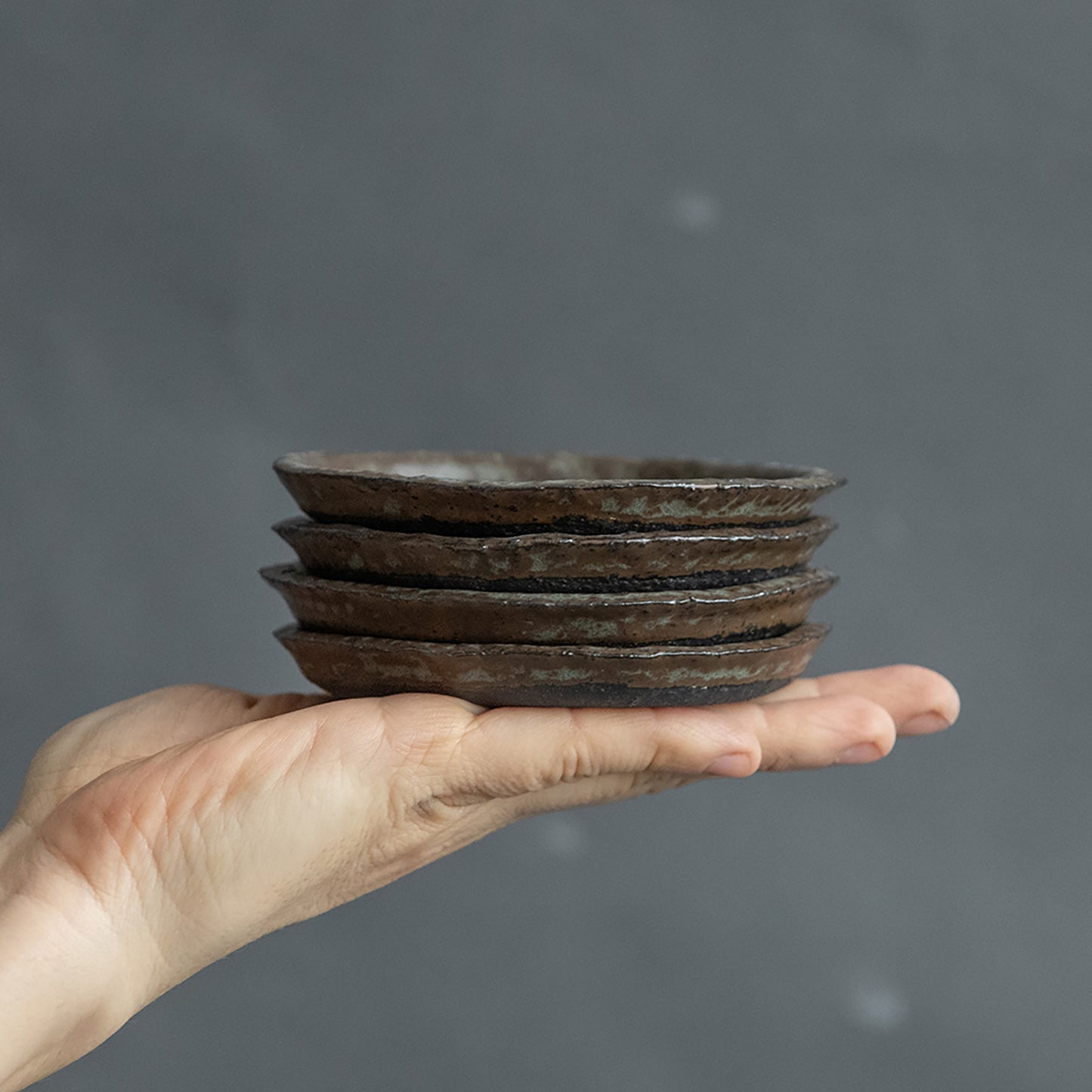 set of 2 flat plates for every day in wabi-sabi design, dark greenish color, handmade ceramic, stoneware