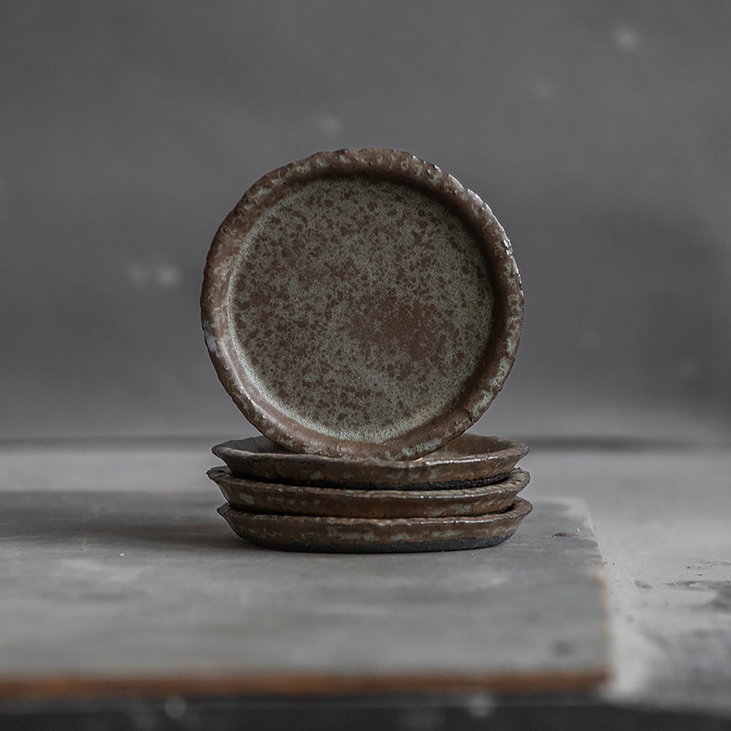 set of 2 flat plates for every day in wabi-sabi design, dark greenish color, handmade ceramic, stoneware