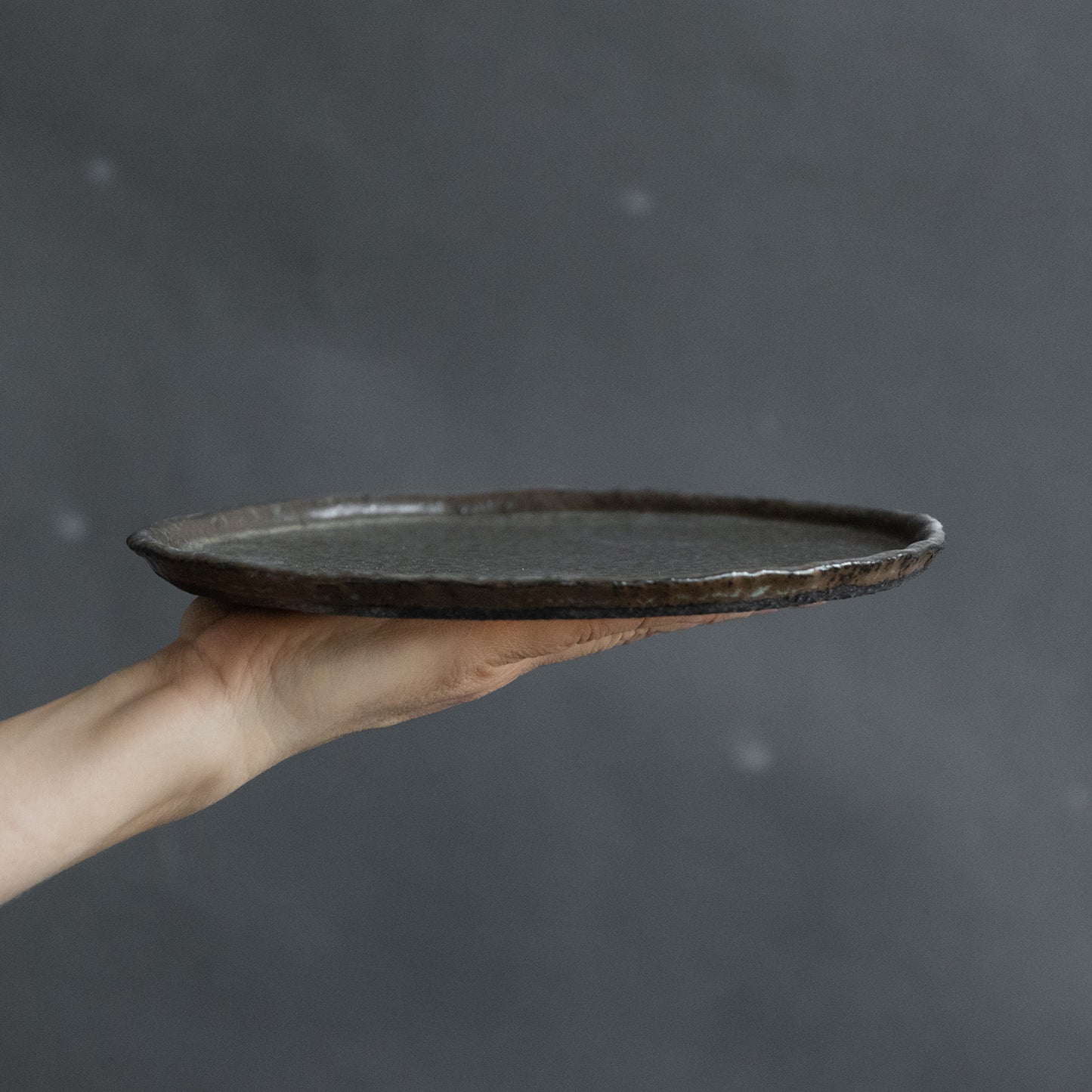 set of 2 flat plates for every day in wabi-sabi design, dark greenish color, handmade ceramic, stoneware