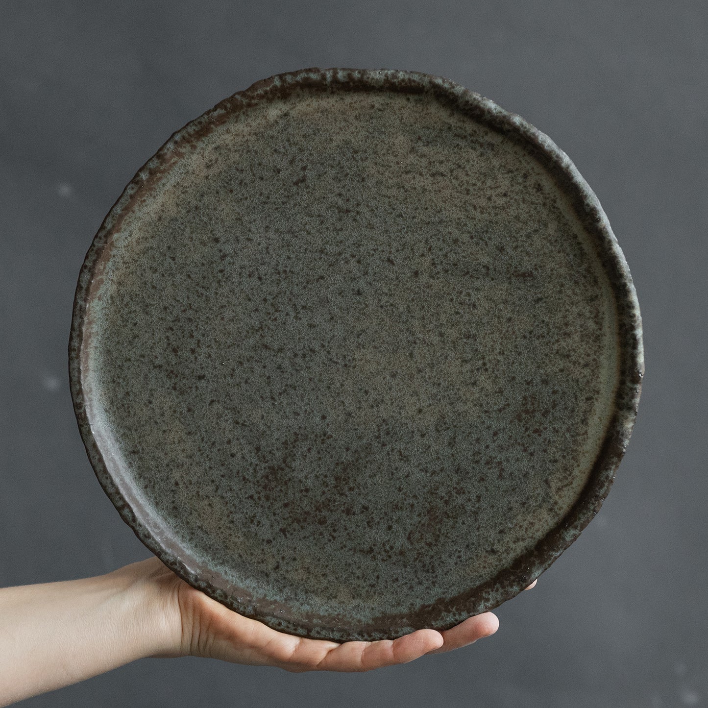 set of 2 flat plates for every day in wabi-sabi design, dark greenish color, handmade ceramic, stoneware