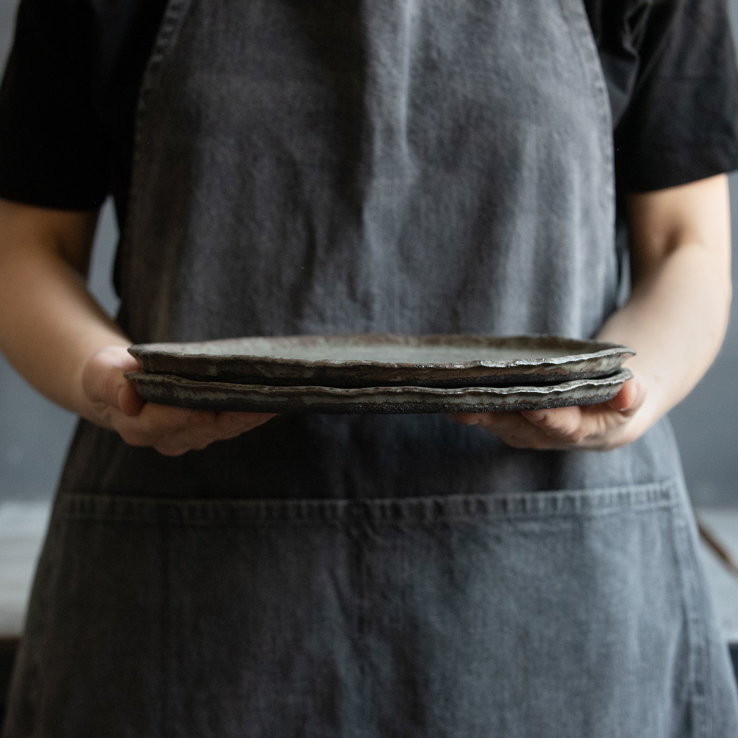 set of 2 flat plates for every day in wabi-sabi design, dark greenish color, handmade ceramic, stoneware