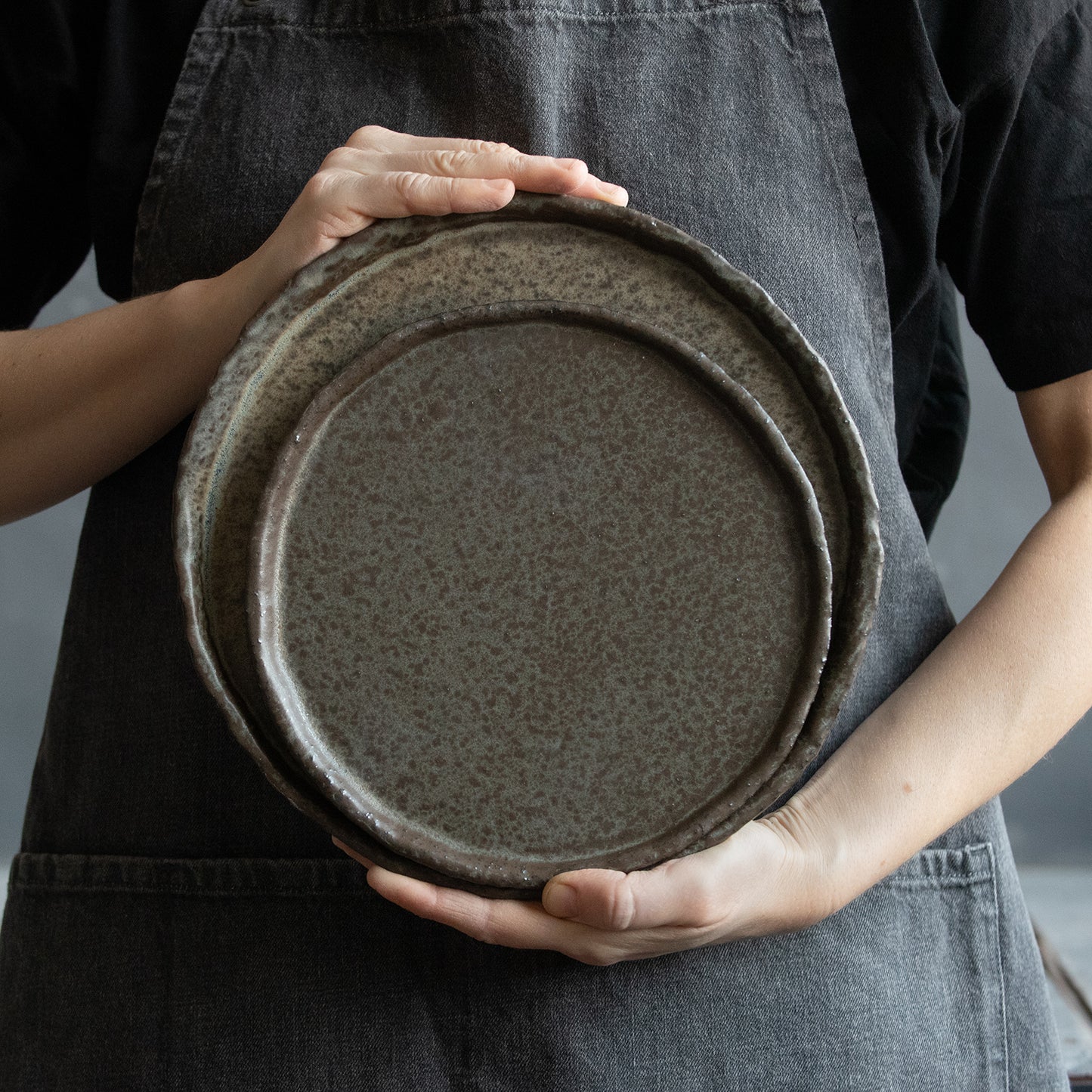 set of 2 flat plates for every day in wabi-sabi design, dark greenish color, handmade ceramic, stoneware