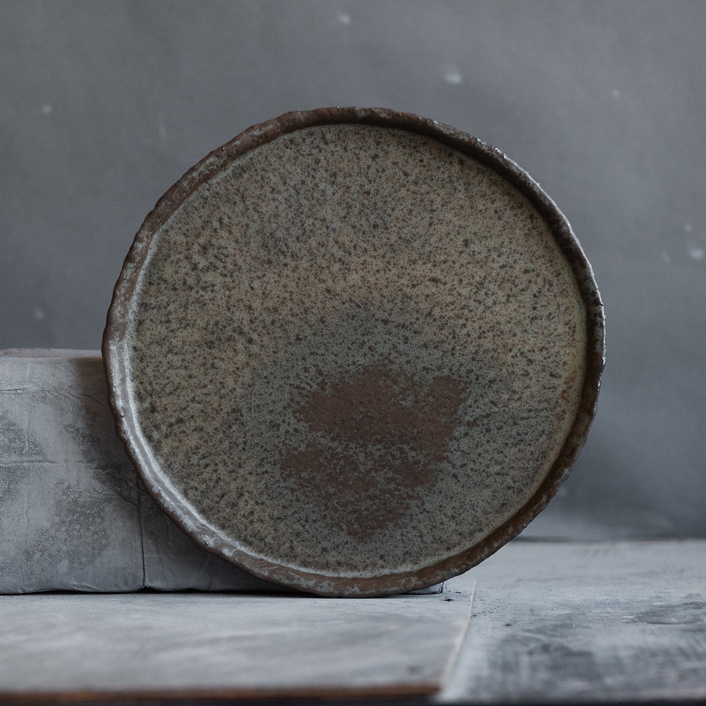 set of 2 flat plates for every day in wabi-sabi design, dark greenish color, handmade ceramic, stoneware