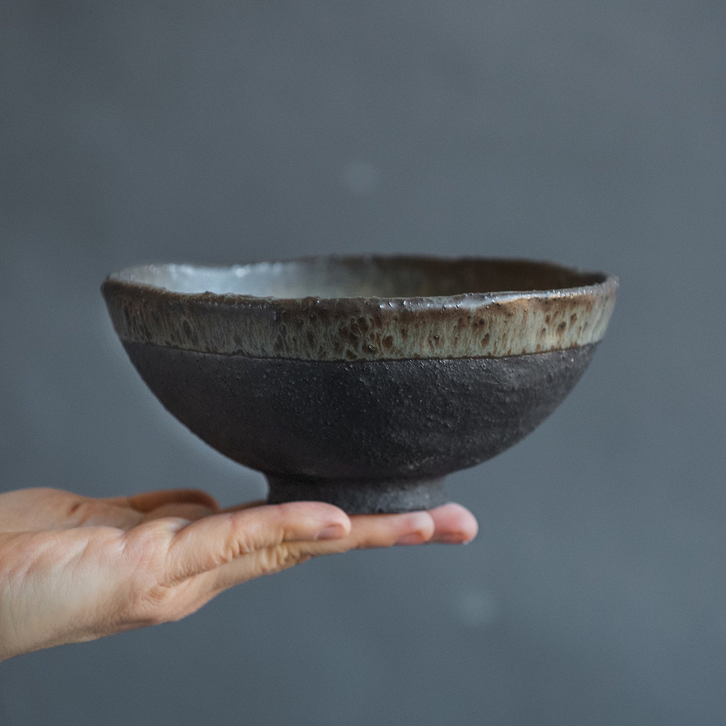 middle-sized RAMEN BOWL, noodle, cereal, soup, or pasta bowl in dark greenish in wabi-sabi style for everyday in minimal design, stoneware, handmade ceramic