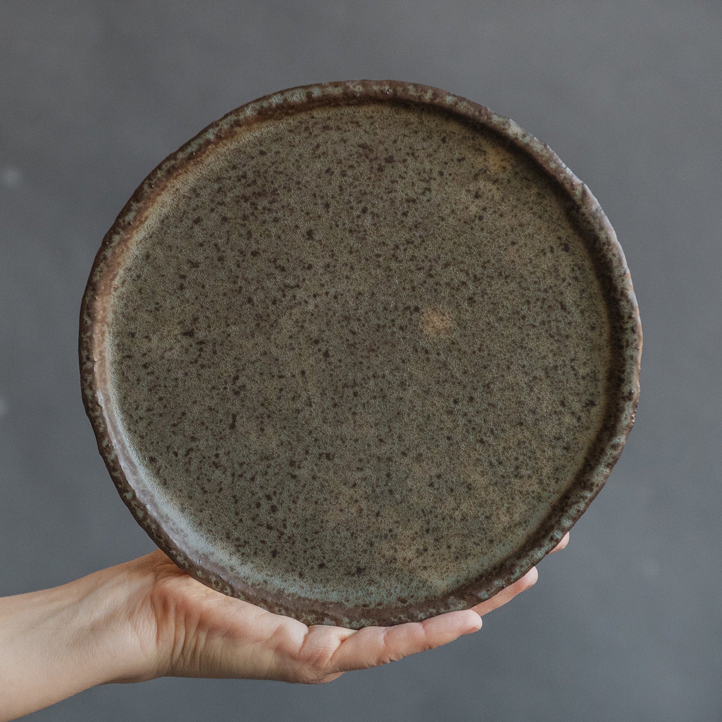 set of 2 flat plates for every day in wabi-sabi design, dark greenish color, handmade ceramic, stoneware