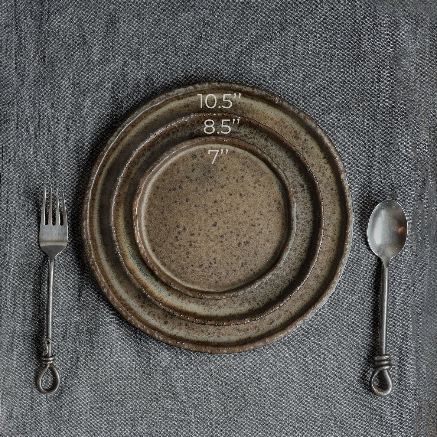 set of 10 x 9.7'' or 10 x 10.5'' flat plates in dark greenish color, handmade ceramic, stoneware