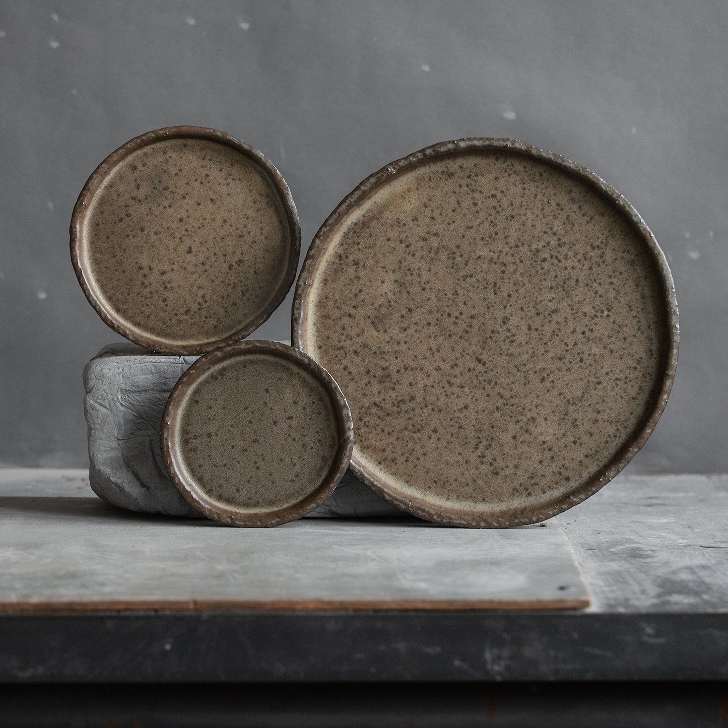 set of 2 flat plates for every day in wabi-sabi design, dark greenish color, handmade ceramic, stoneware