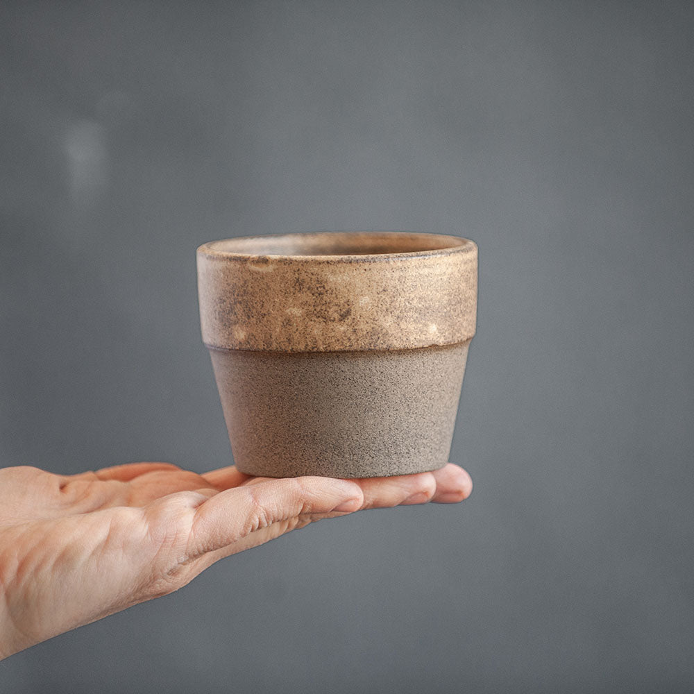 A couple of 180ml conical сoffee tumbler in warm beige and grey blue